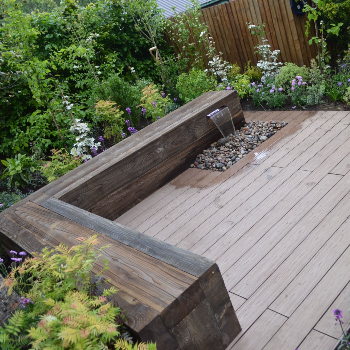 Decorative waterfall feature built into Alchemy Habitat decking