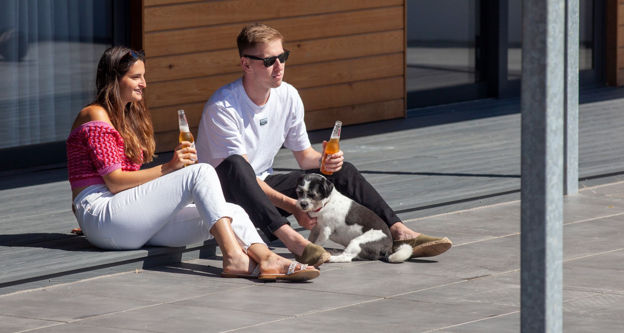 Young Couple enjoying their newly installed Alchemy Composite Decking